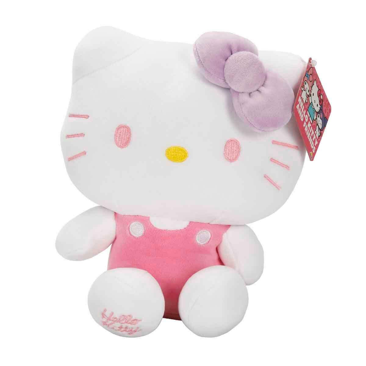 Hello Kitty Pembe Tulumlu Peluş S5 | 22 CM Mor Fiyonklu Figür | Orijinal Tasarım Yumuşak Oyuncak